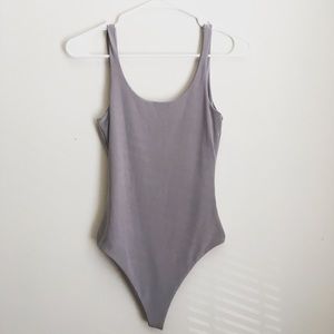 Open back bodysuit. **Never worn**